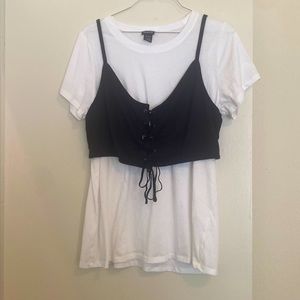 Torrid white t-shirt with attached black tie corset. Size 2.